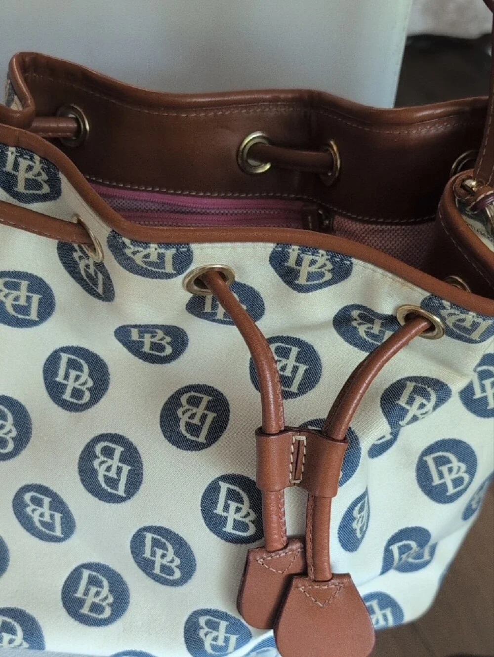 Dooney & Bourke Cream Canvas DB Logo Drawstring Shoulder Bag with Brown Trim